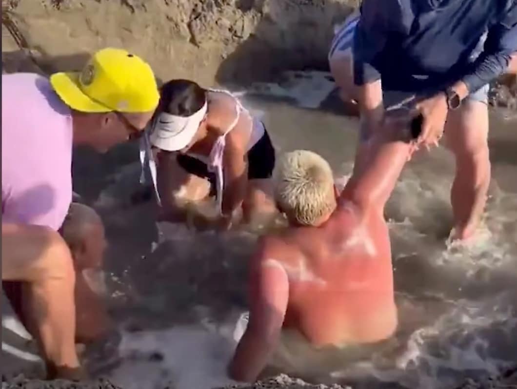 Two Children Trapped in Wet Sand Hole at Newport Beach Pier