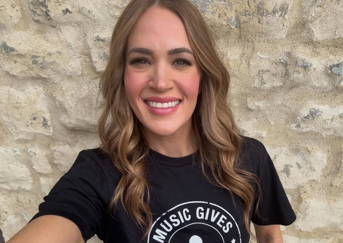Carrie Underwood smiling with brunette hair in selfie promoting St. Jude fundraiser