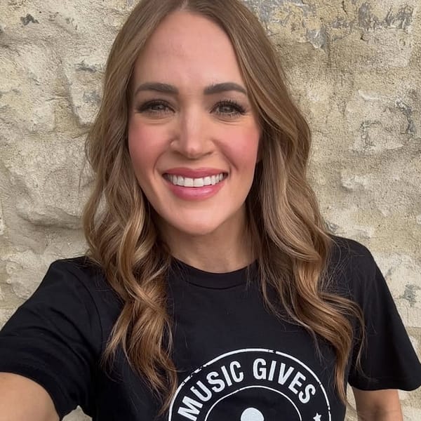 Carrie Underwood smiling with brunette hair in selfie promoting St. Jude fundraiser